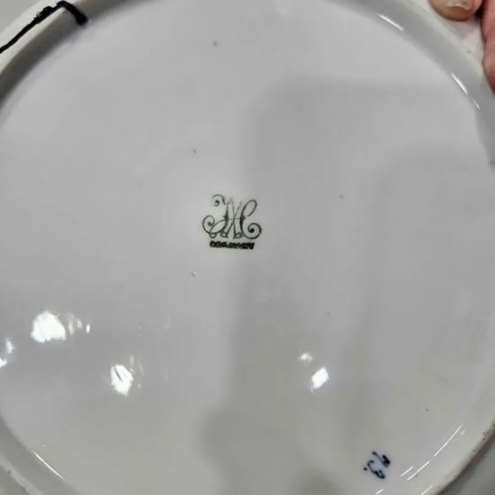Blue and white windmill decorative plate